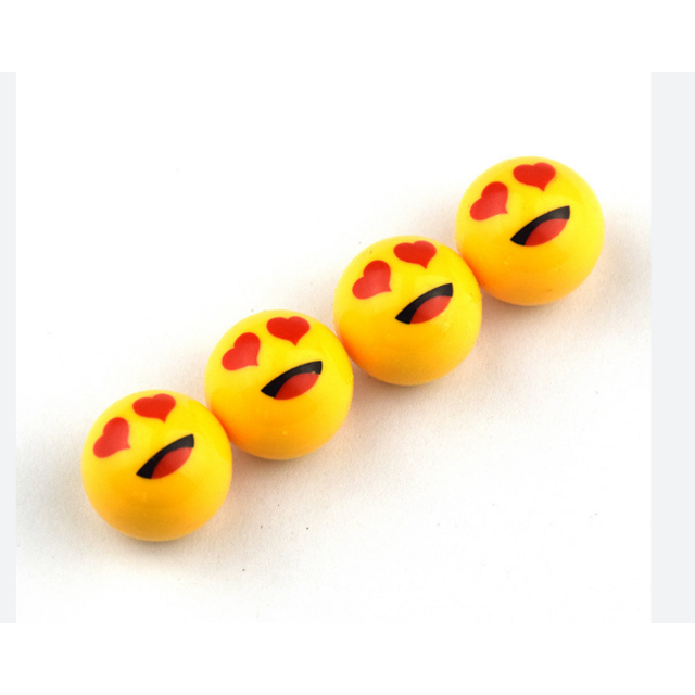 Βαλβίδες τροχών σε σχέδιο emoji φατσούλα