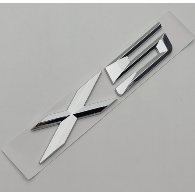 Αυτοκόλλητο μεταλλικό χρωμίου 15x3cm - Bmw X5